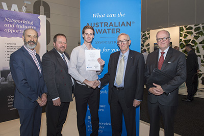 Luke Greenbank (centre) with award sponsors from the Water Directorate to his right and AWA to his left